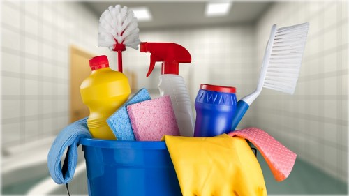 After builders cleaning removing dust from a renovated room