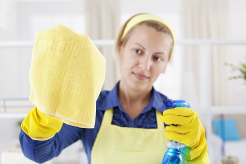 Professional cleaning team handling end of tenancy cleaning in a kitchen