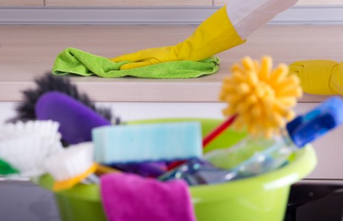 Clean kitchen cabinets and countertops after move in cleaning