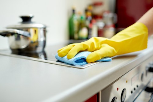 Professional cleaner preparing a short-term rental